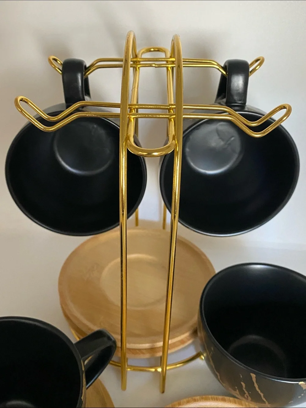 Black and Gold Marble Ceramic Coffee /Tea cups with coasters, set of four .